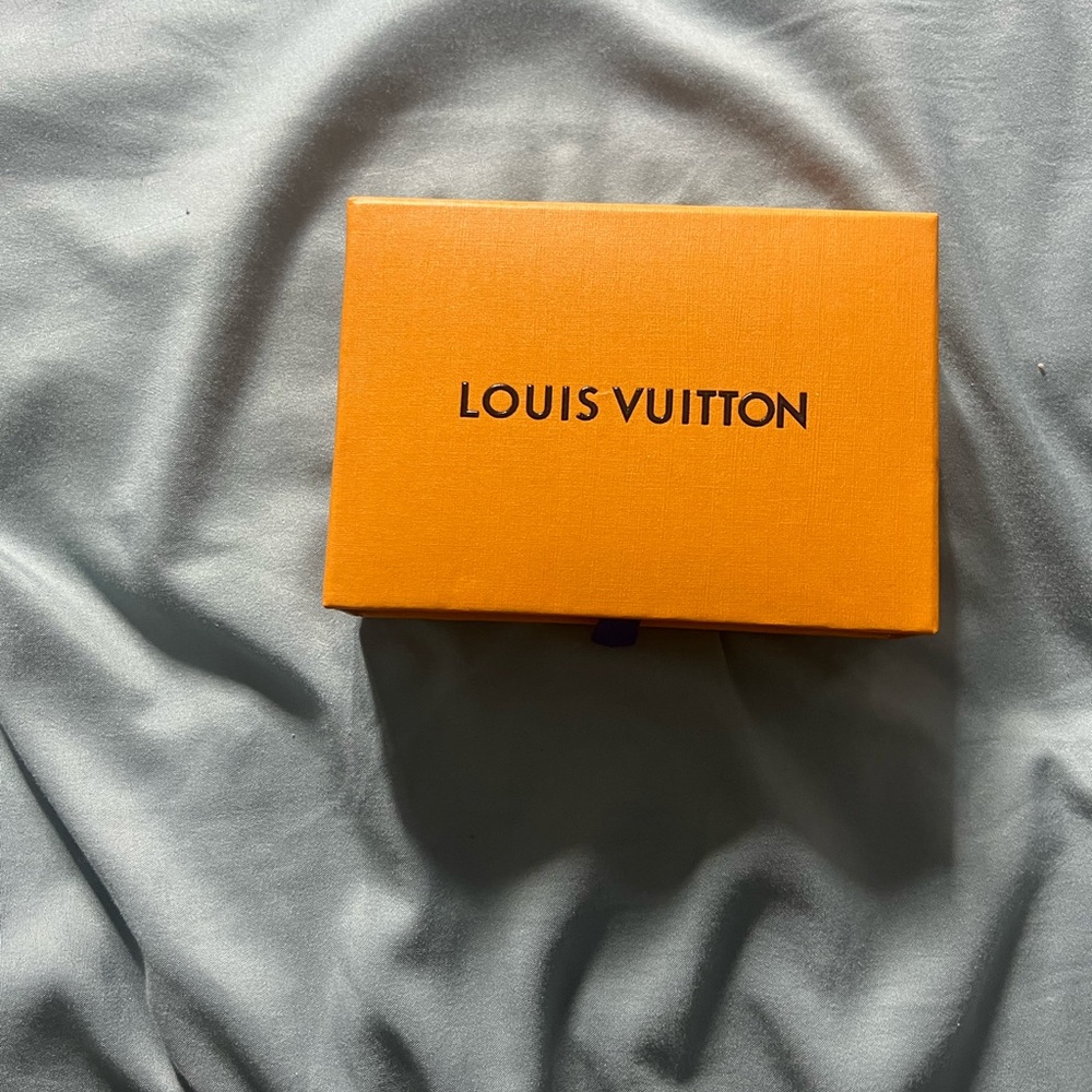 Louis Vuitton Orange box  and Black bracelet